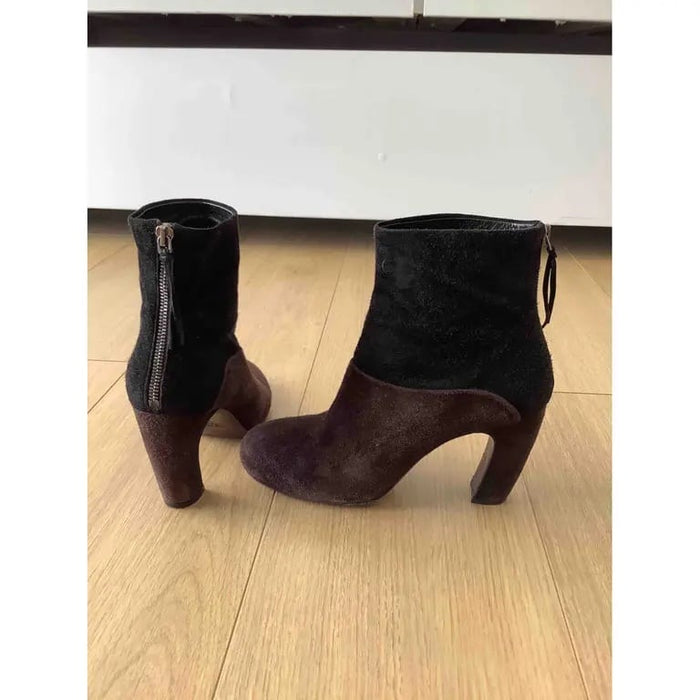 sc:https://old.stylecycle.gr/media/catalog/product/b/l/black-suede-miu-miu-boots-41549484-6_2_1.jpg