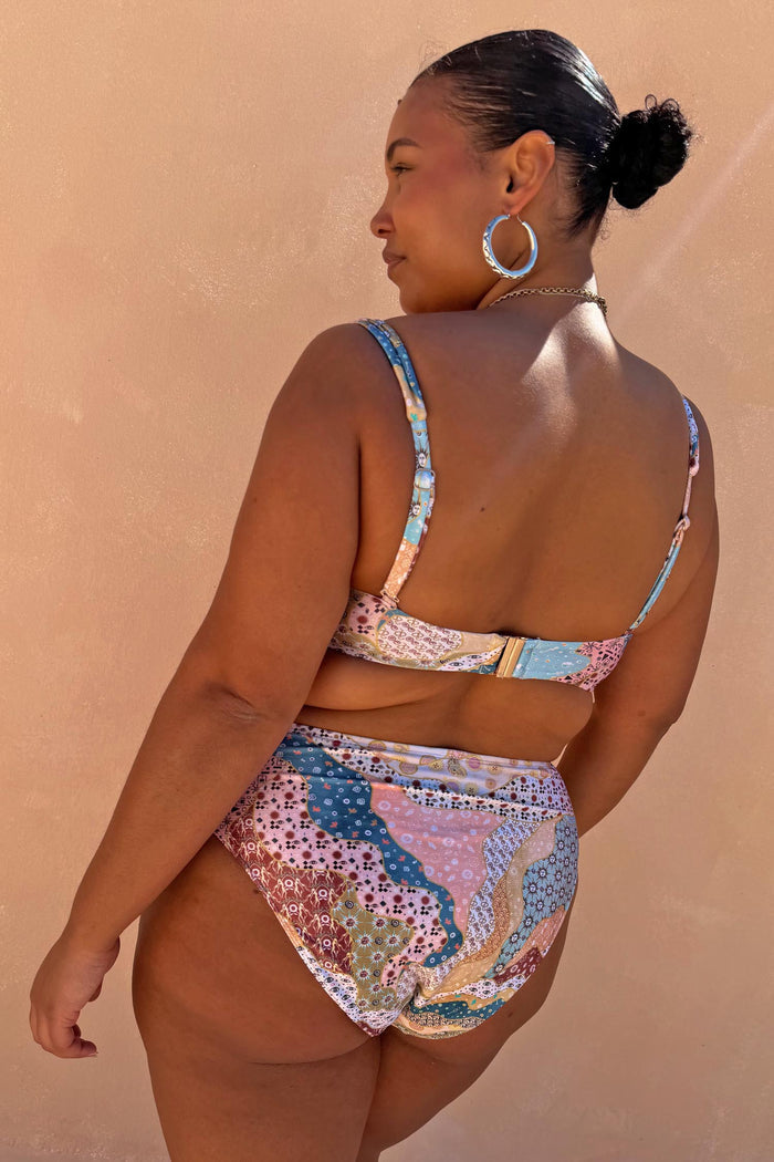 Morocco Bikini Top and bottoms with sun washed celestial motifs and patchwork detailing, shown from the back.