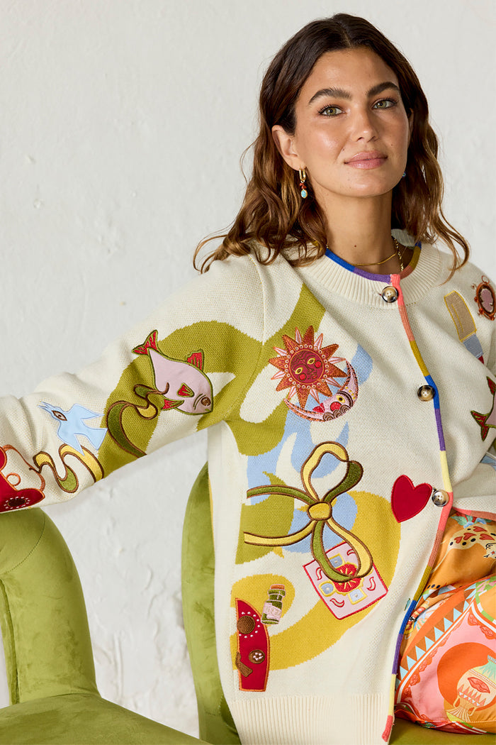 Cream Multi Enchanted Cardigan in a cotton knit featuring enchanted motifs and a multi-coloured trim.
