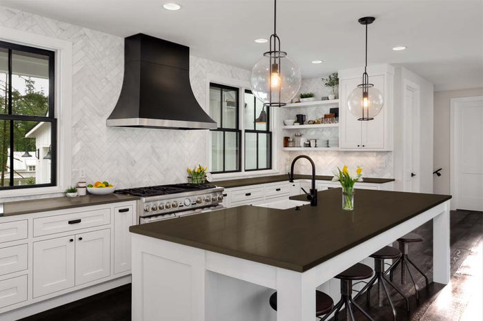 Retique It Multi-purpose Smooth Finish Kit (Large) in Charcoal for interior wood surfaces, displayed on a kitchen countertop.