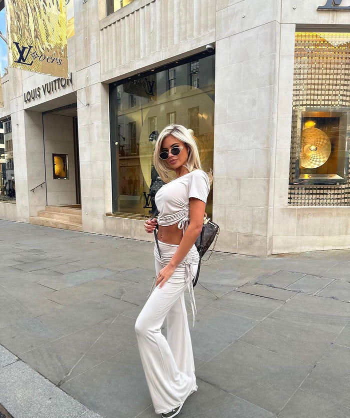 OFF WHITE ROUND NECK RUCHED CROP TOP AND FLARED TROUSER CO-ORD - Style Heist