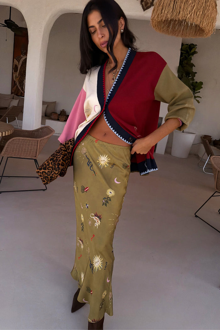 Olive Mystical Dorris Skirt with sun and moon motifs in a relaxed midi silhouette, designed in London.