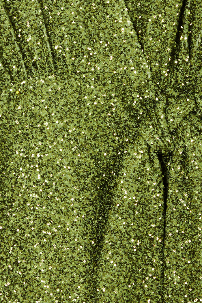 Olive green sequin fabric on the Mini Vienna dress, highlighting the textured wrap tie fastening detail.