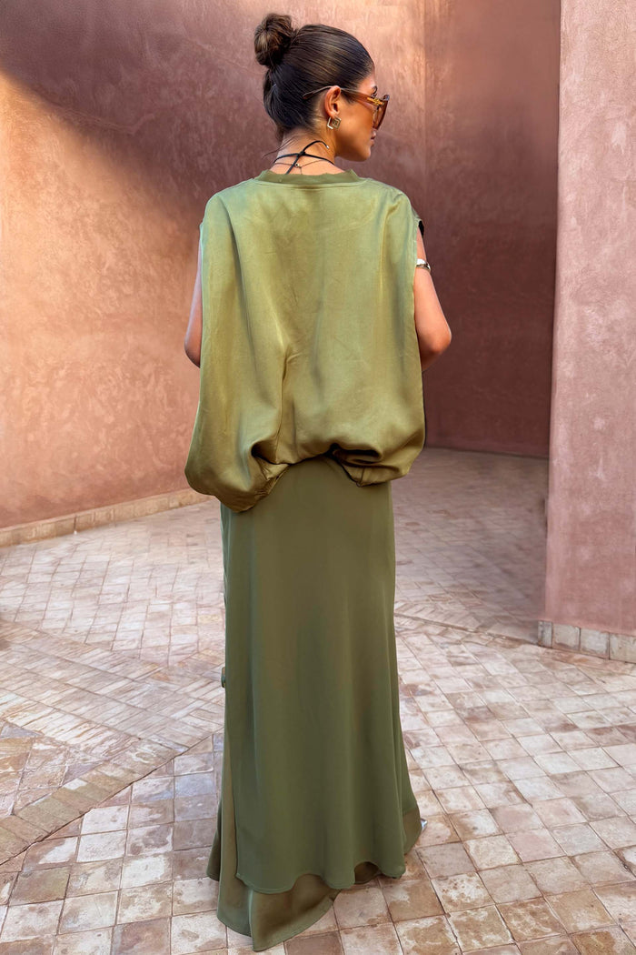 Olive Wrap Jojo Midi Skirt in tonal khaki with matte and satin panels, shown from the back with a matching top.