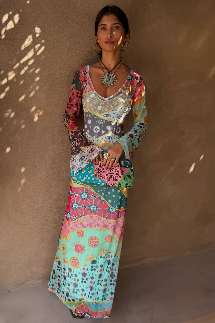 Pastel Morocco Mesh Vivi Dress featuring sun and eye motifs, long sleeves and a sheer multi-wear mesh fabric.