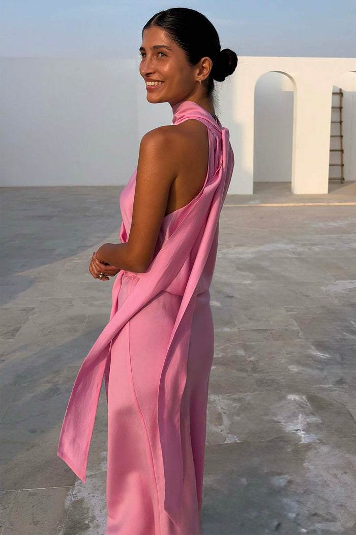 Pink Billie Top featuring a draped halterneck and long multi-wear ties in a soft pink shade, designed in London.