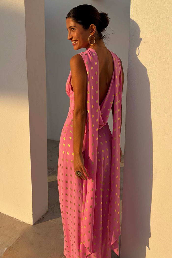 Pink Sophie Dress with gold flecks, featuring a statement draped back and multi-wear scarf detail.