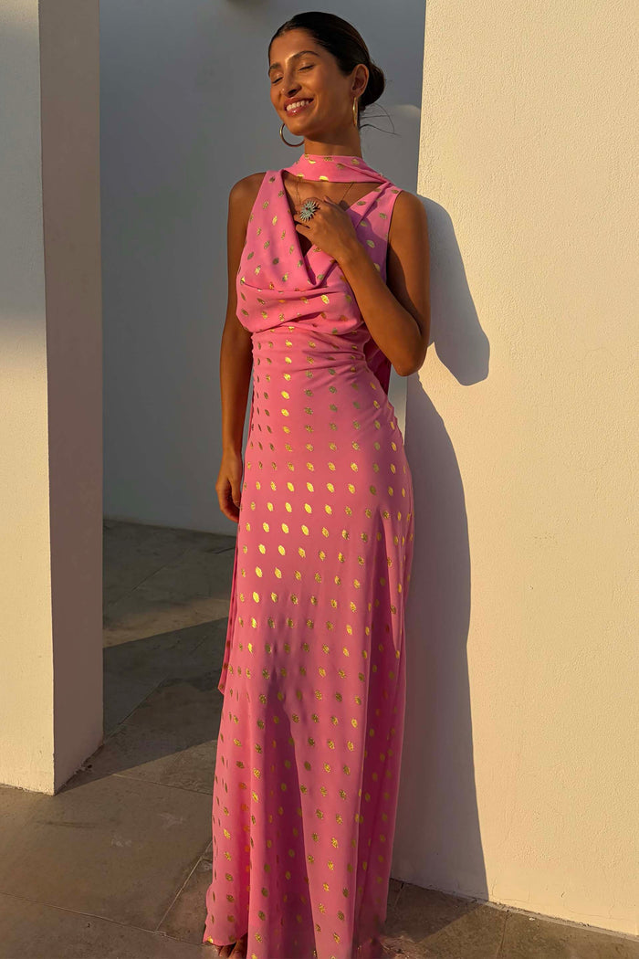 Pink Sophie Dress with gold flecks and multi-wear scarf, featuring a bias-cut drape on a model.