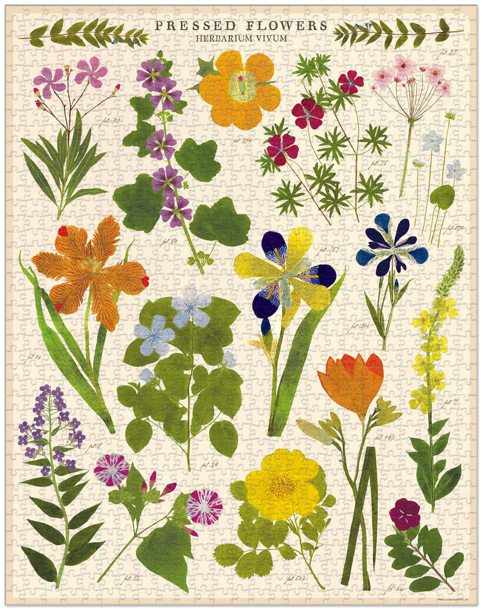A jigsaw puzzle box with a floral design, labeled "Pressed Flowers Puzzle," containing 1000 pieces. Made by Cavallini Papers & Co.