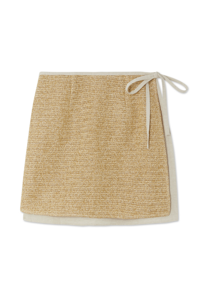 Cream Raffia Wrap Mini Skirt with a woven front panel and side tie fastening, designed in London.