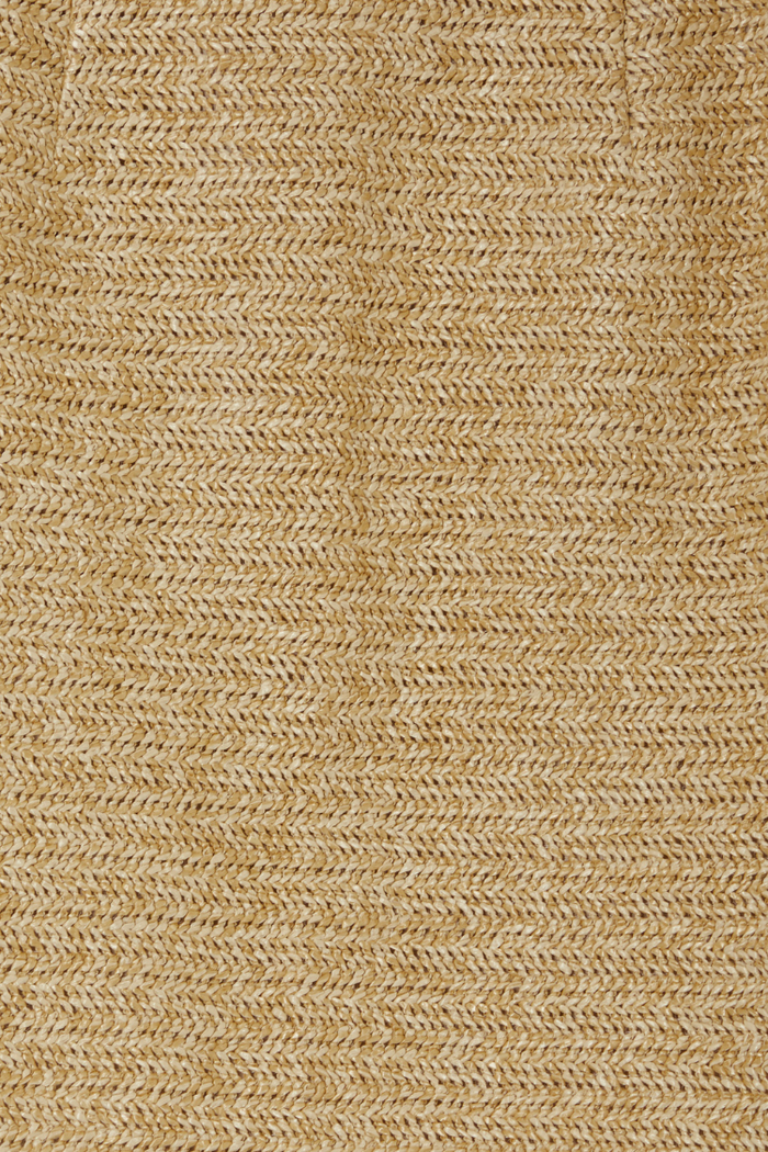 Detail of the natural woven raffia material on the Raffia Wrap Skirt, highlighting the intricate herringbone pattern.