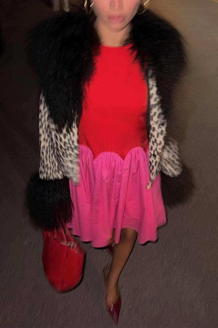 Red and Pink Mini Monika Dress featuring a scalloped waist and pleated skirt, styled with a leopard print jacket.