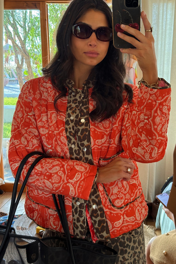 Red Bandana Reversible Jacket in quilted fabric with leopard print trim, model wears size M.