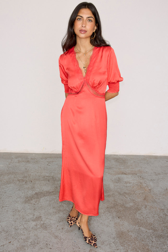 Red May Dress featuring delicate lace trim, V-neckline and short sleeves with elasticated cuffs.