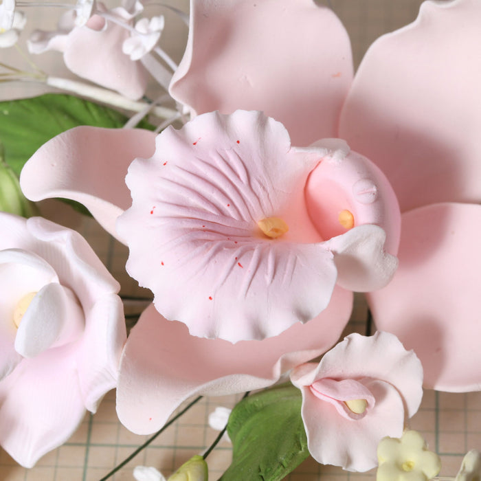 Large Cymbidium Orchid Gumpaste Sugarflower Sprays perfect as a cake topper for cake decorating fondant cakes.  Wholesale Sugarflowers and cake supply. Caljava