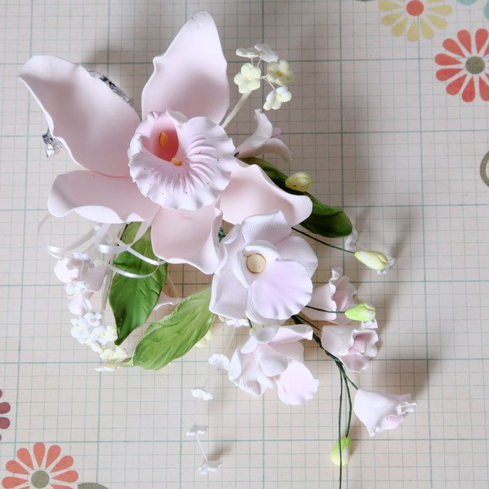 Large Cymbidium Orchid Gumpaste Sugarflower Sprays perfect as a cake topper for cake decorating fondant cakes.  Wholesale Sugarflowers and cake supply. Caljava