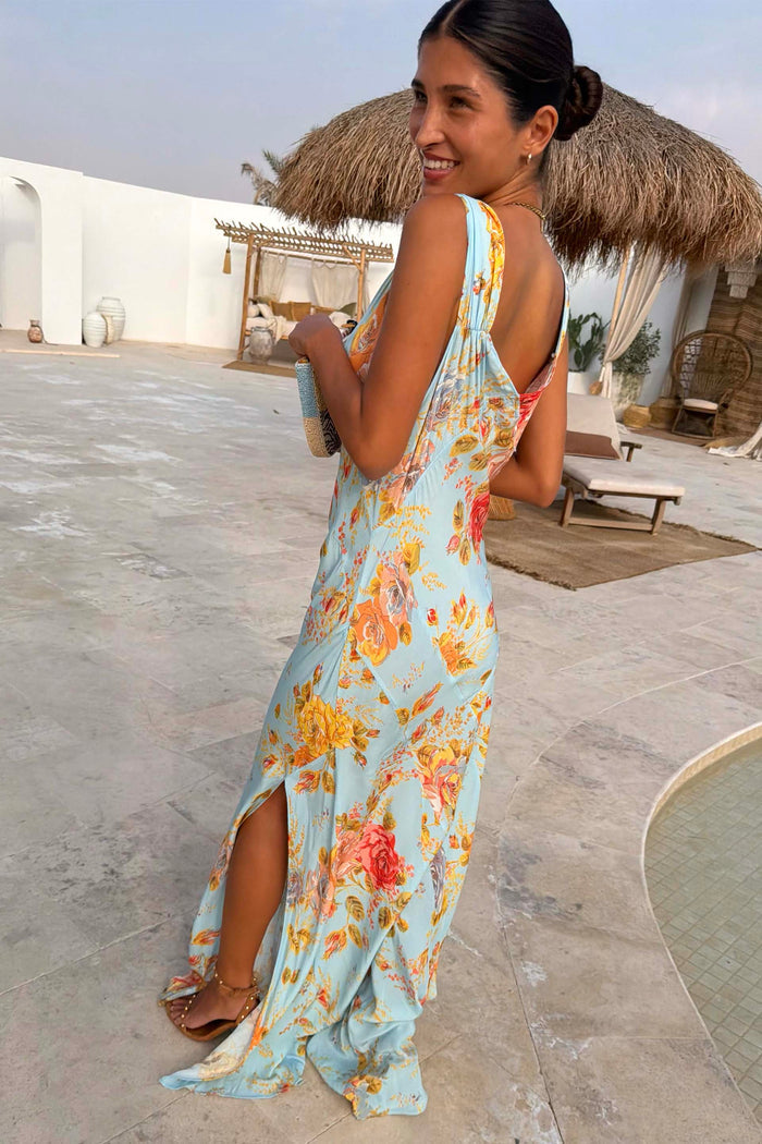 Sky Blue Sofia Dress in a floral print with tie shoulders and a side slit, cut on the bias for a fluid drape.
