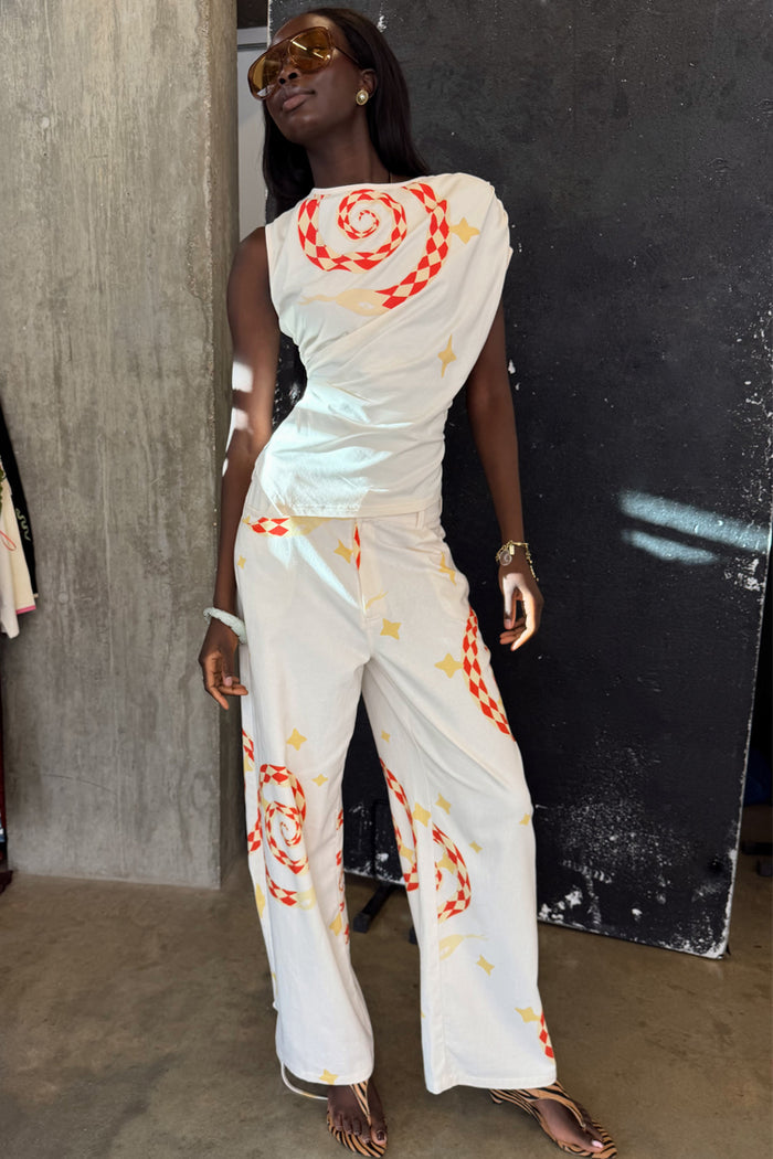 White Snake Tie Side Trousers in cotton twill with orange snake and star motifs and a wide leg silhouette.