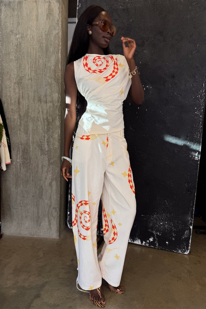 White Snake Tie Side Trousers in cotton twill with snake and star motifs and multi-wear tie ankle details.