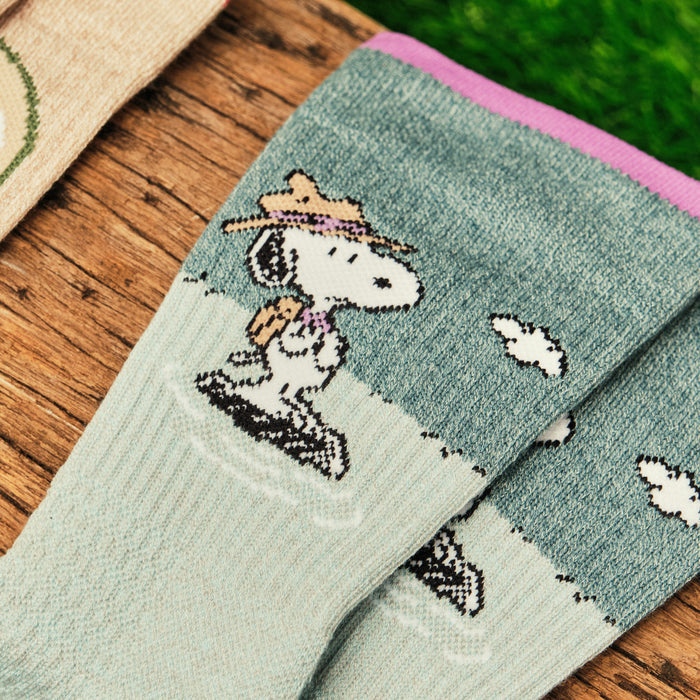 Aqua marl crew compression socks with a Snoopy Beagle Scout design, shown flat.