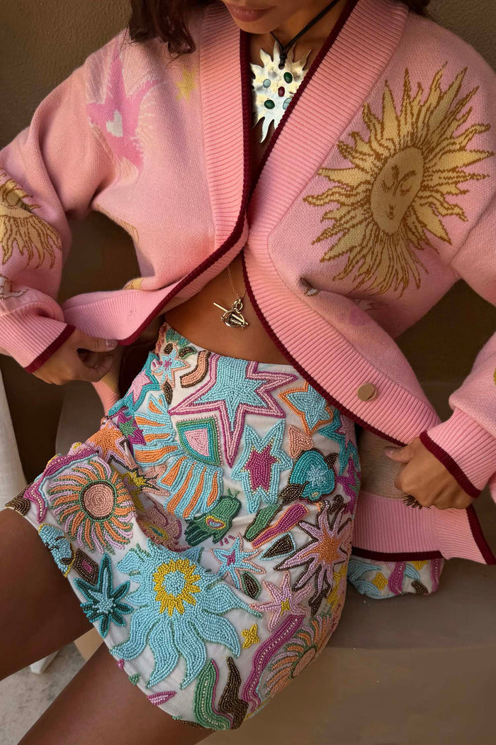 Star Beaded Dreamer Skirt featuring hand-embroidered glass bead sun and star motifs in pastel tones.