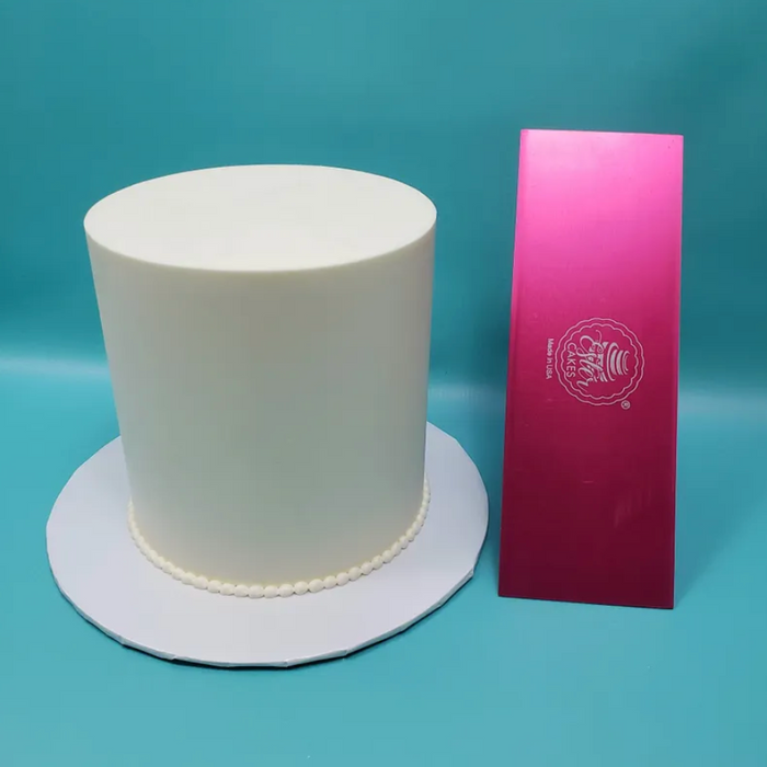 Create smooth, textured, and patterned finishes effortlessly with our durable 10"x4" Tall Icing Cake Smoother. Perfect for buttercream, fondant, and frosting, this versatile cake decorating tool is ideal for bakers of all skill levels, ensuring professional, clean results on every cake. Buttercream Icing Cake Decorating Tool by Caljava.