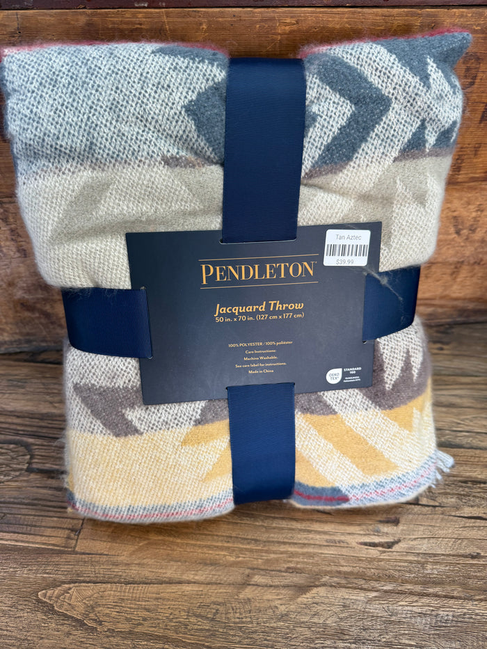 Oversized throw blanket with off-white and blue geometric Aztec pattern, with fringe