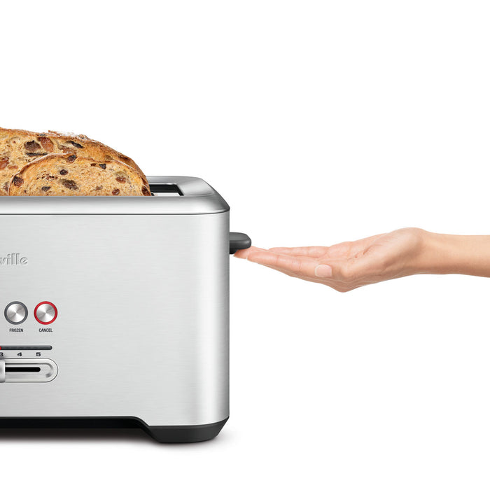 Breville 'A Bit More'® 4-slice toaster with sleek design, featuring adjustable browning control and wide slots for bread and waffles.