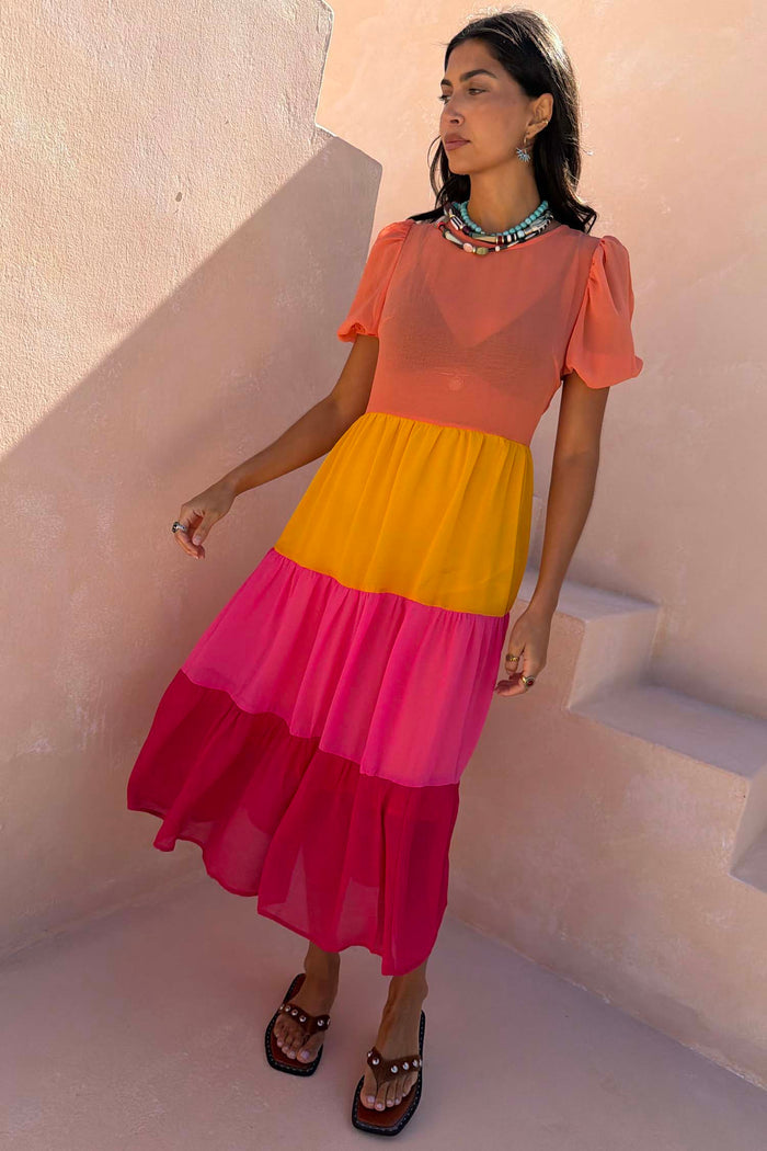 Tiered Orange and Pink Abigail Petite Dress with a sheer bodice, puff sleeves and a floaty multi-coloured skirt.