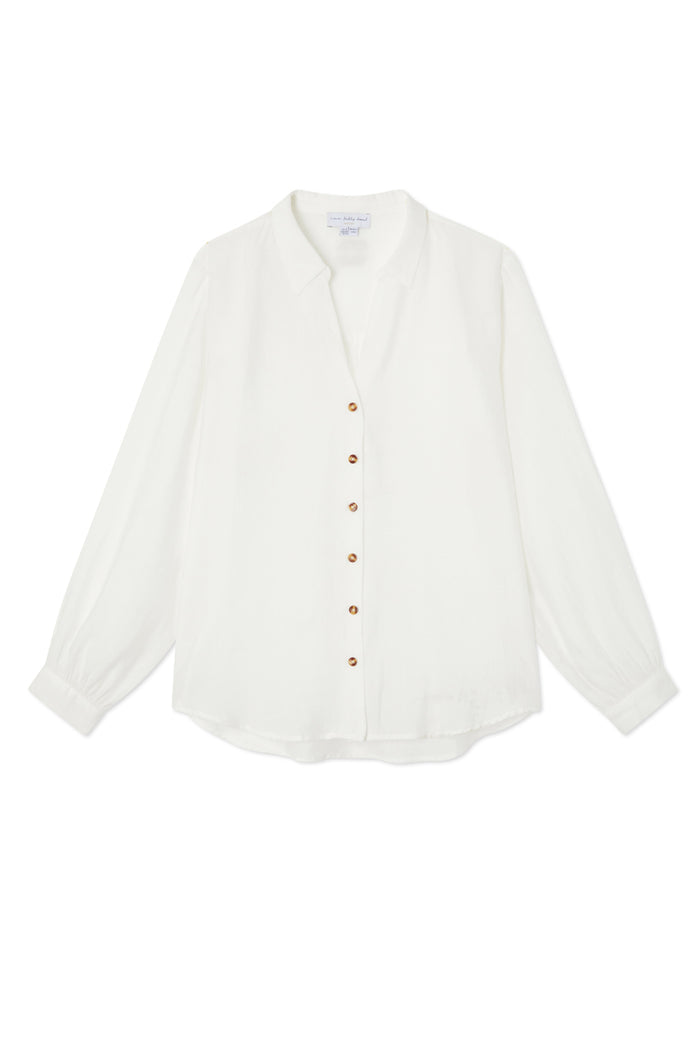 Oversized white Miley shirt featuring blouson sleeves and contrast tortoise buttons in a luxe, lightweight fabric.
