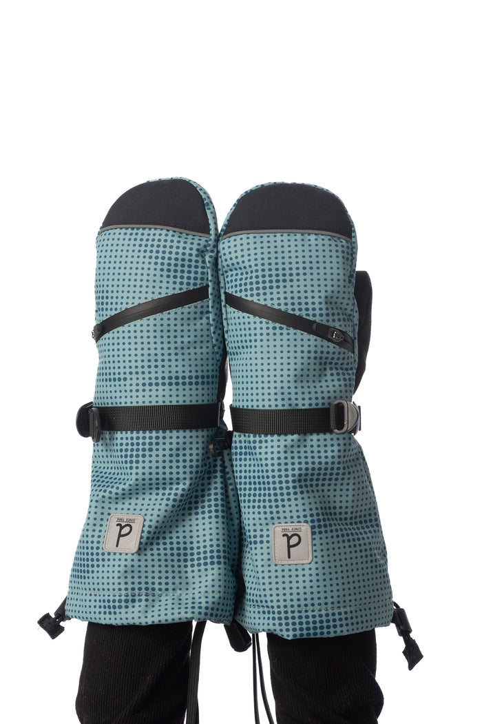 Deux par Deux Teknik kids' mittens, greyish blue with teal dots and mountains – worn by a child