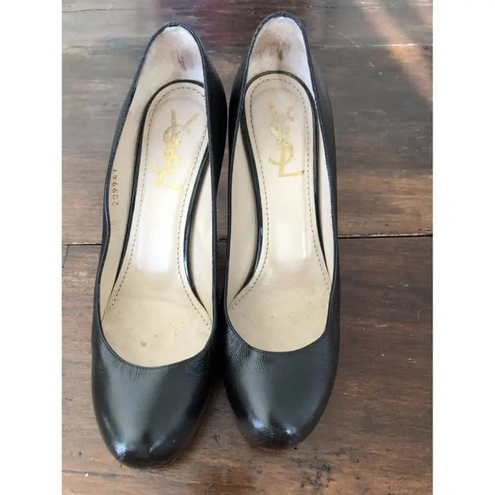 sc:https://old.stylecycle.gr/media/catalog/product/b/l/black-leather-trib-too-yves-saint-laurent-heels-18406476-2_2.jpg